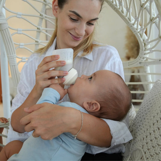 The Benefits of Upright Bottle Feeding: A Gentle Guide for New Parents